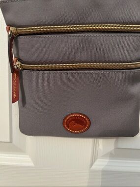 Dooney & Bourke Gray triple zip crossbody bag with Brown Leather Trim